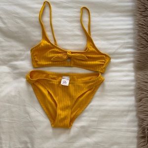 Girls yellow bikini.